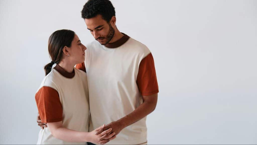 A man and woman holding hands