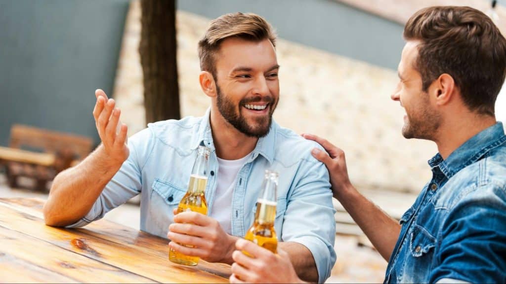Two men having a beer