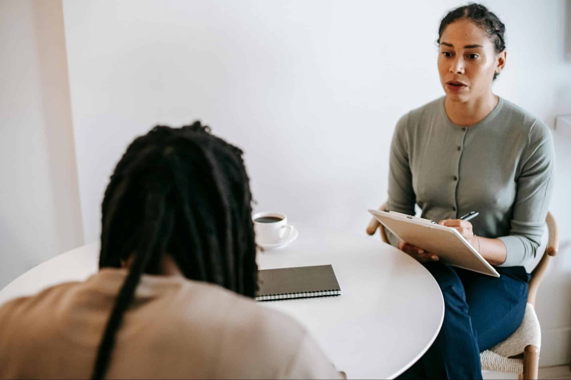 A man and a woman talking