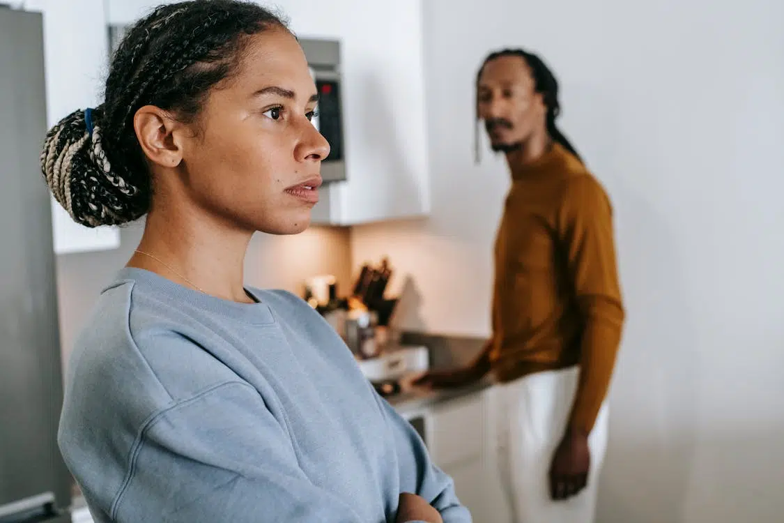 A man looking at a woman