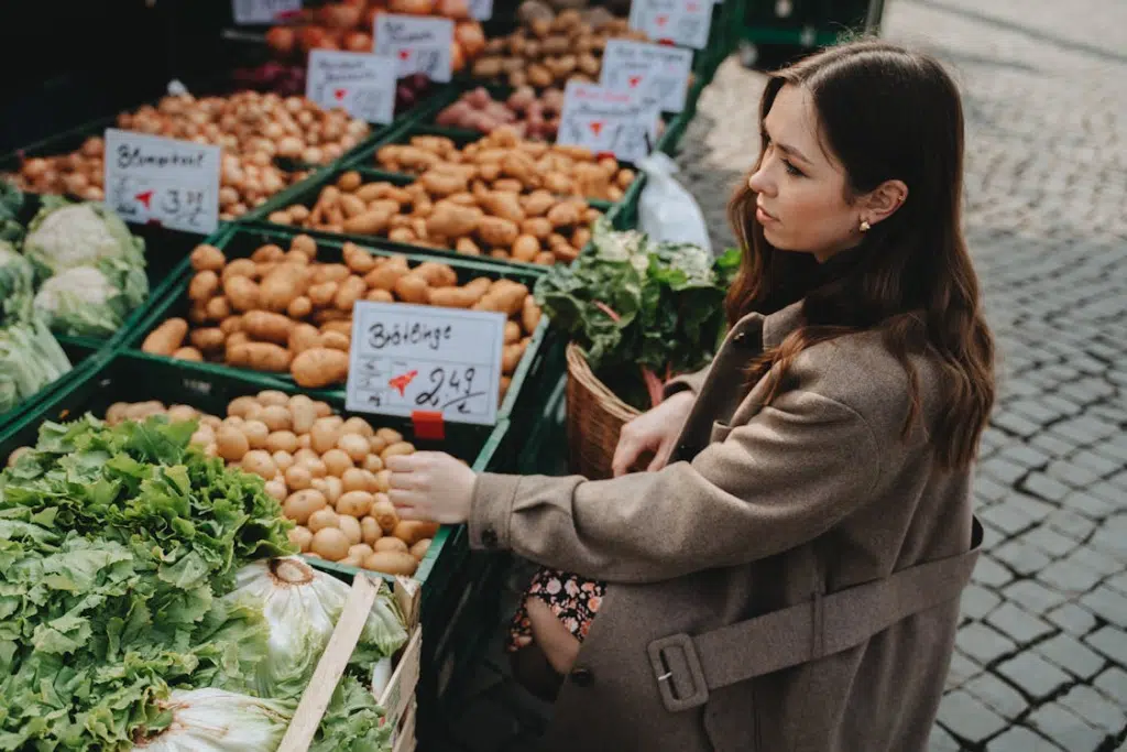 A woman in a brown jacket at the market