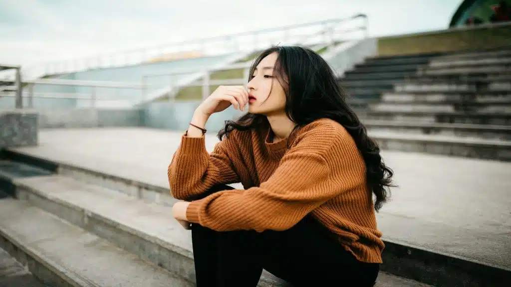 A woman deep in thought