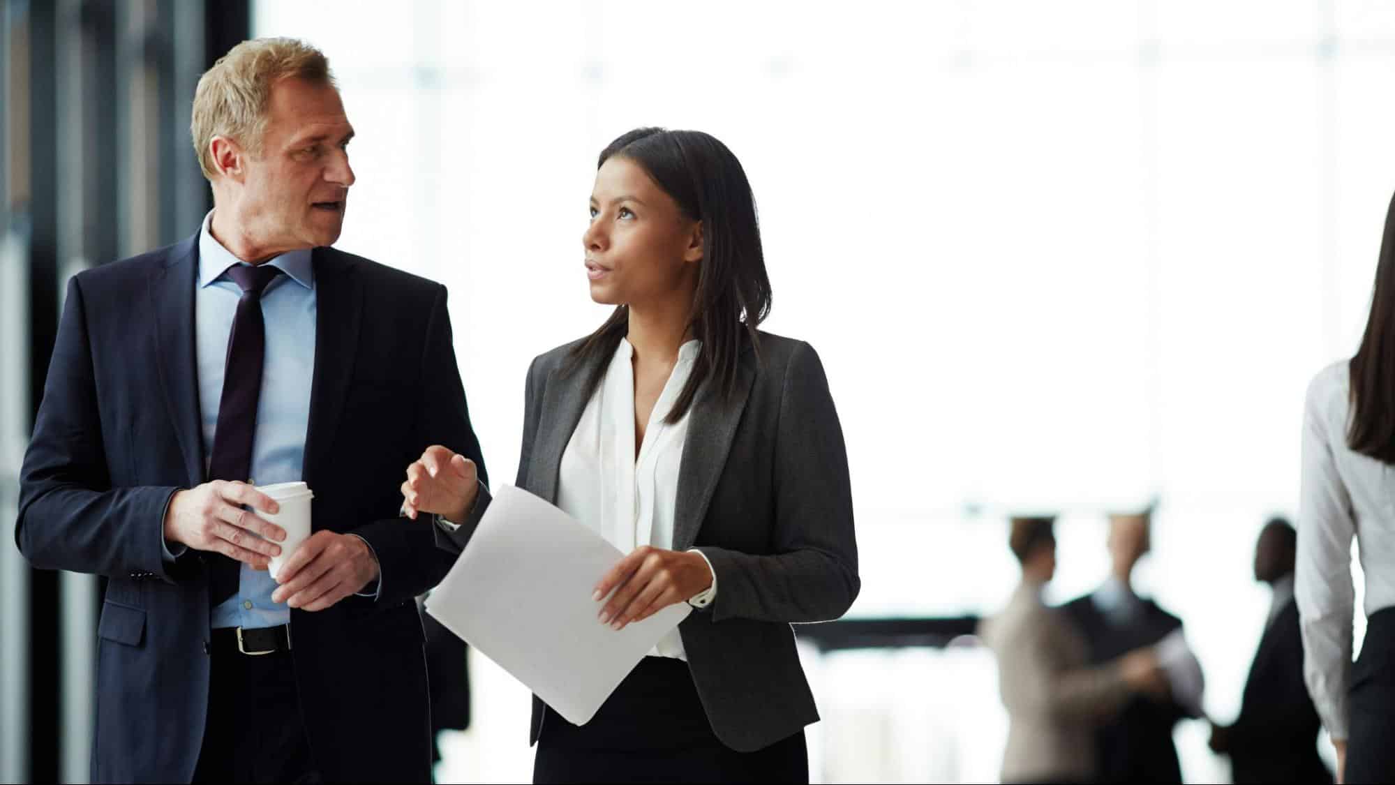 A woman talking to a man