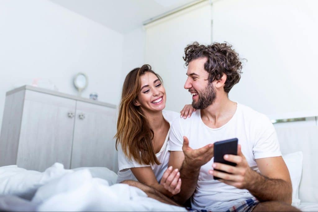 A couple looking at the phone