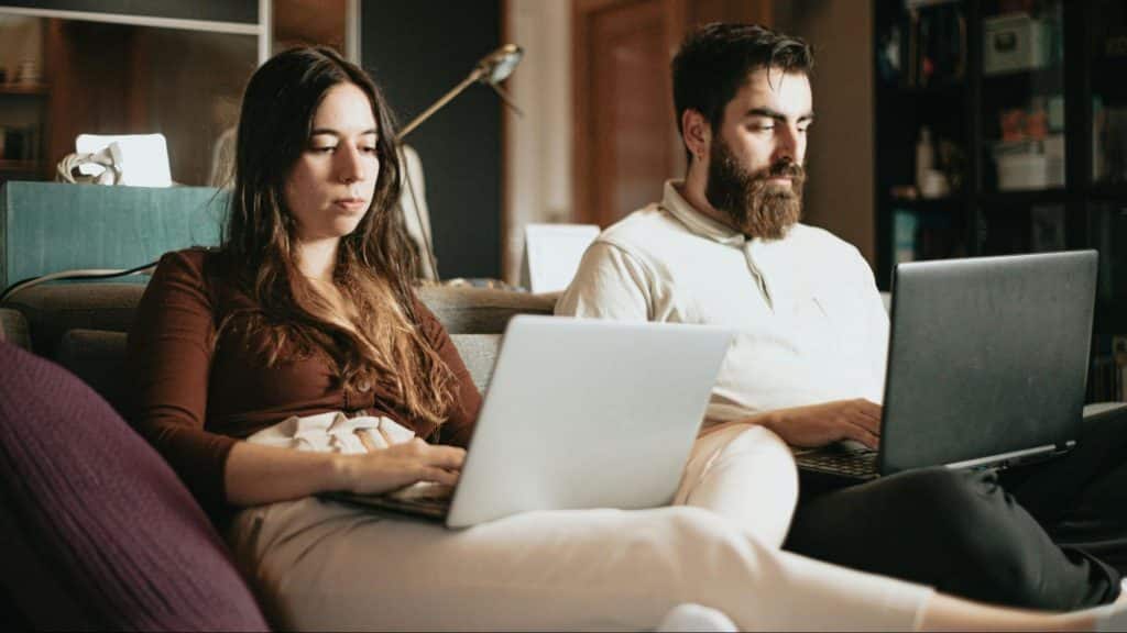 A man and woman serious with their work