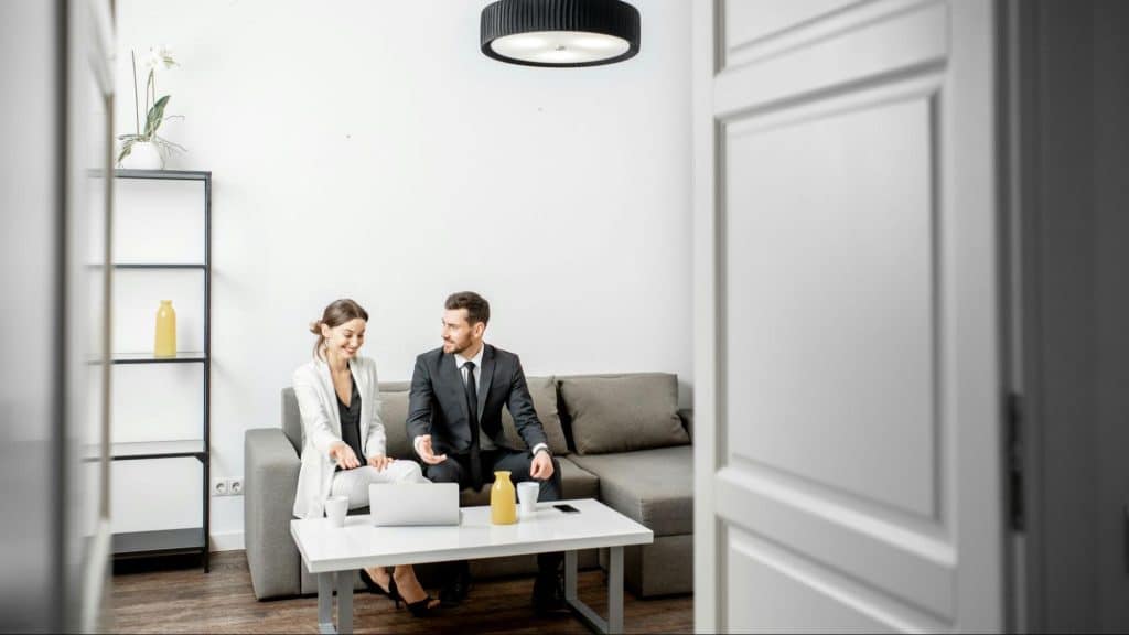 A man and woman at the living room