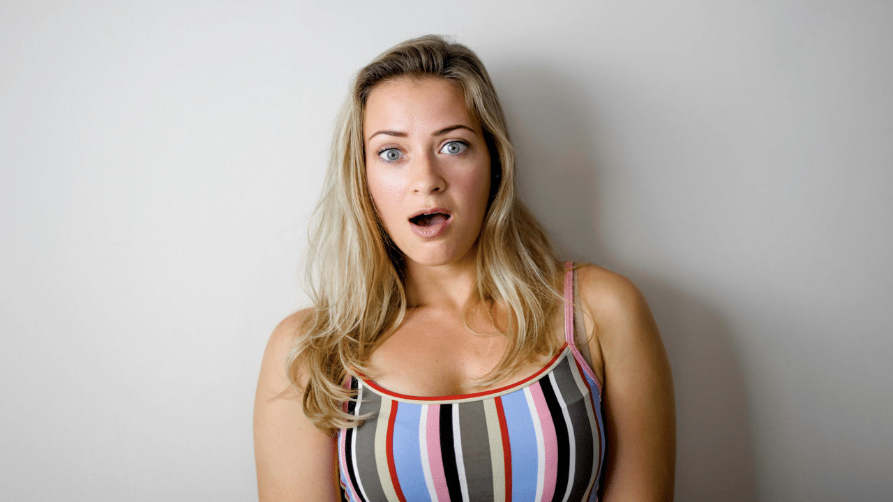 A woman making a mocking face