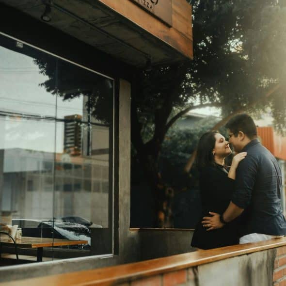 A man and woman facing each other