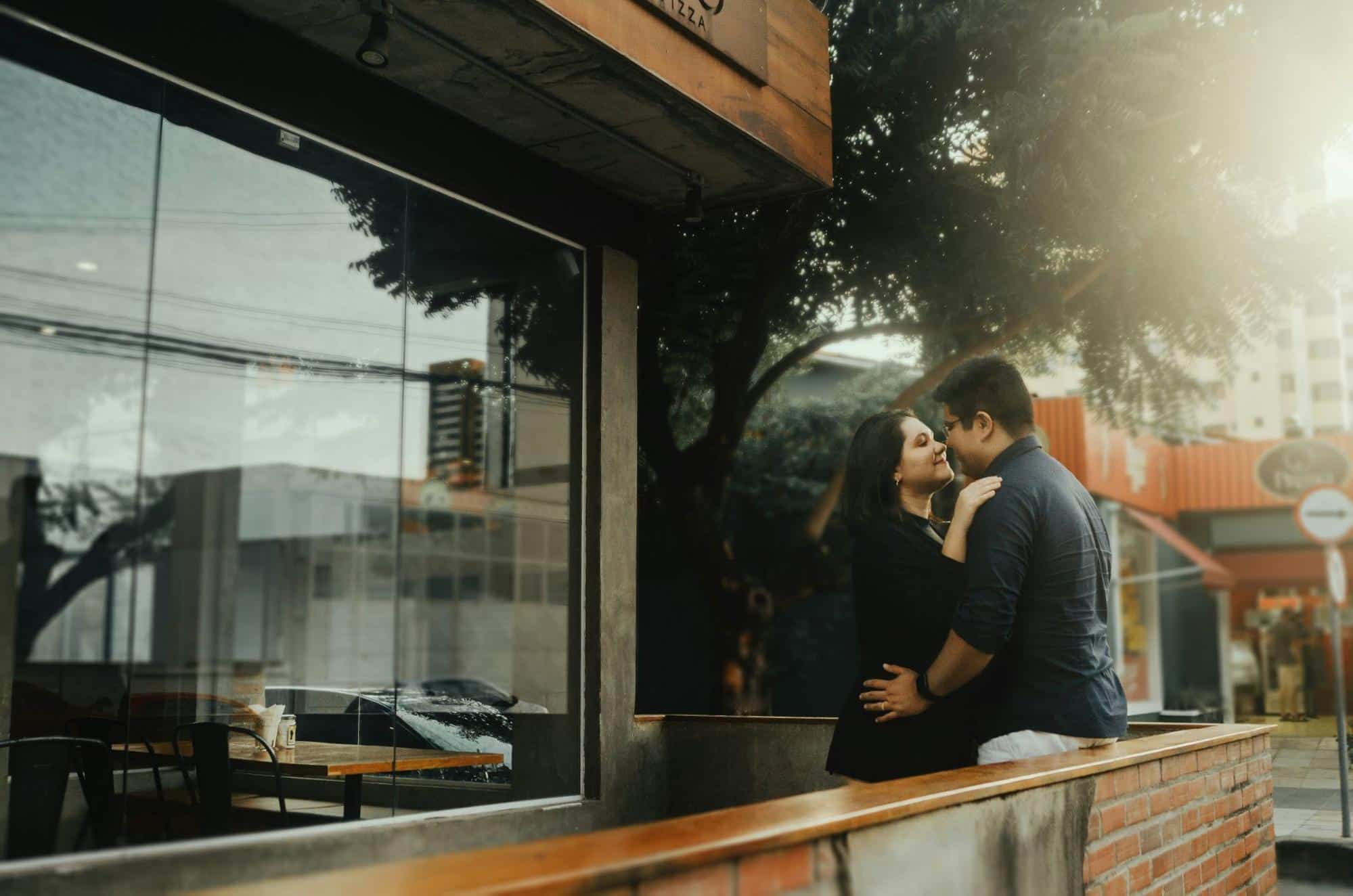 A man and woman facing each other