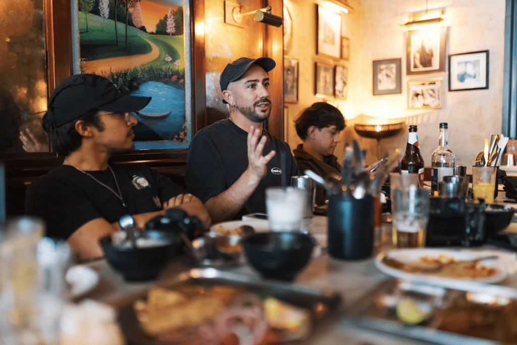 A man talking at a restaurant