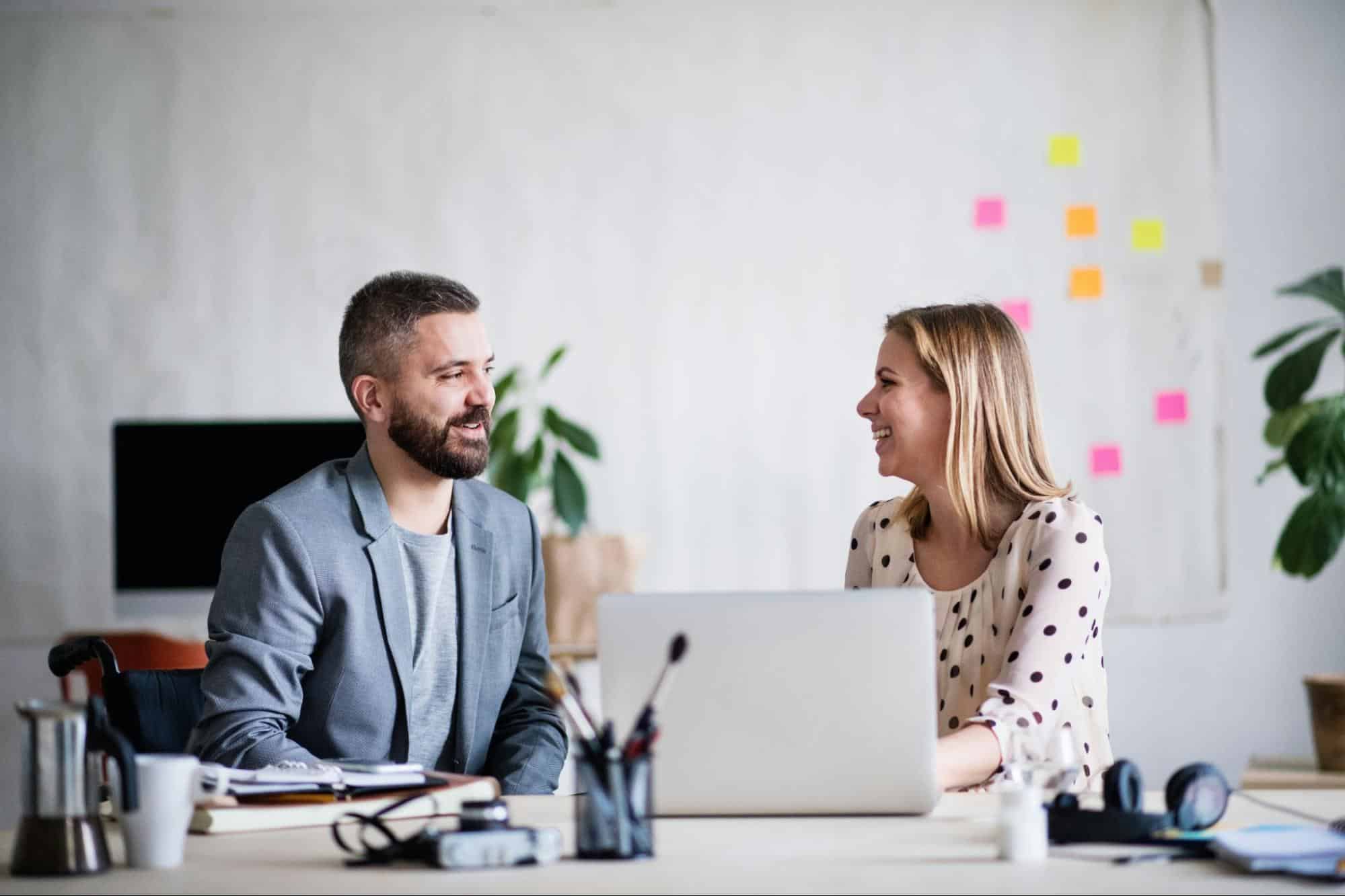 A man and woman talking
