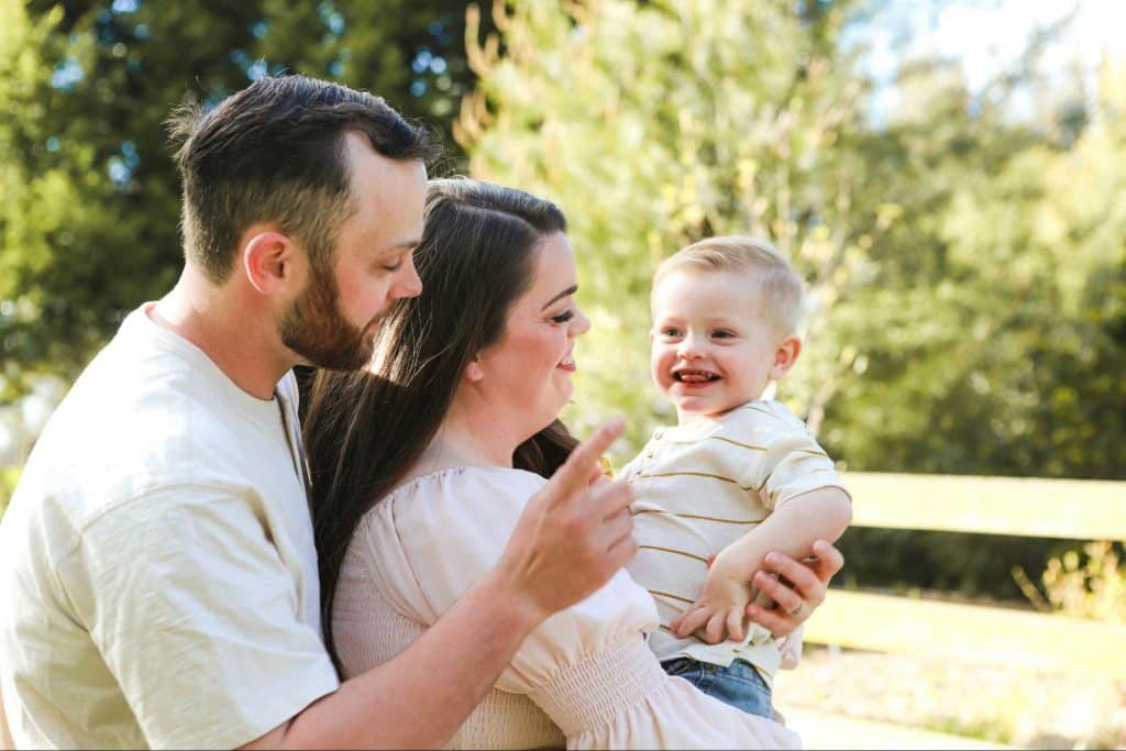 A couple teaching their son
