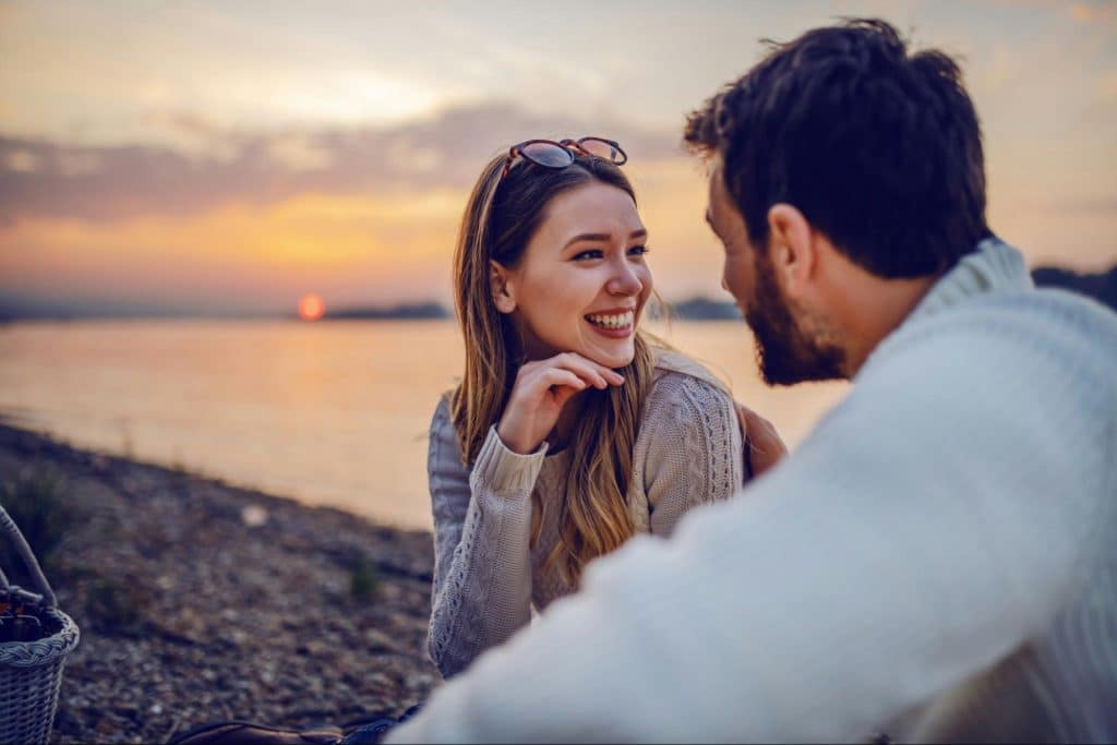 A man and woman talking