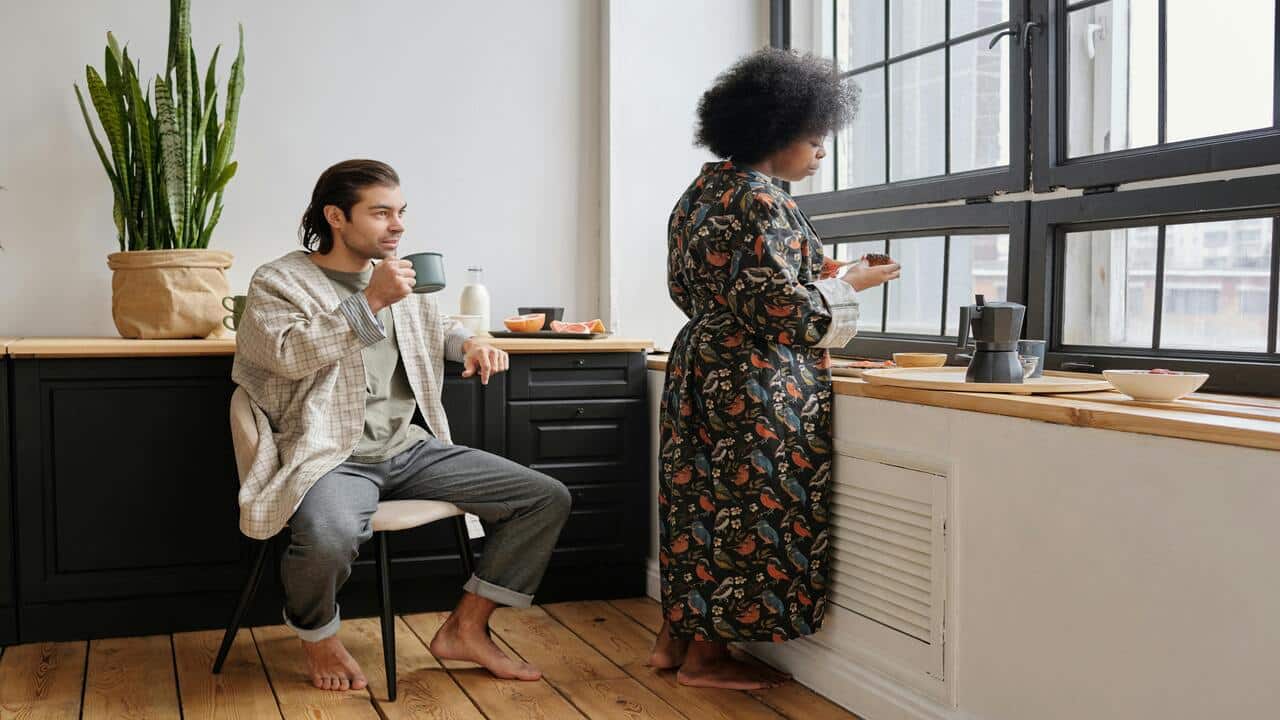A couple having breakfast at home