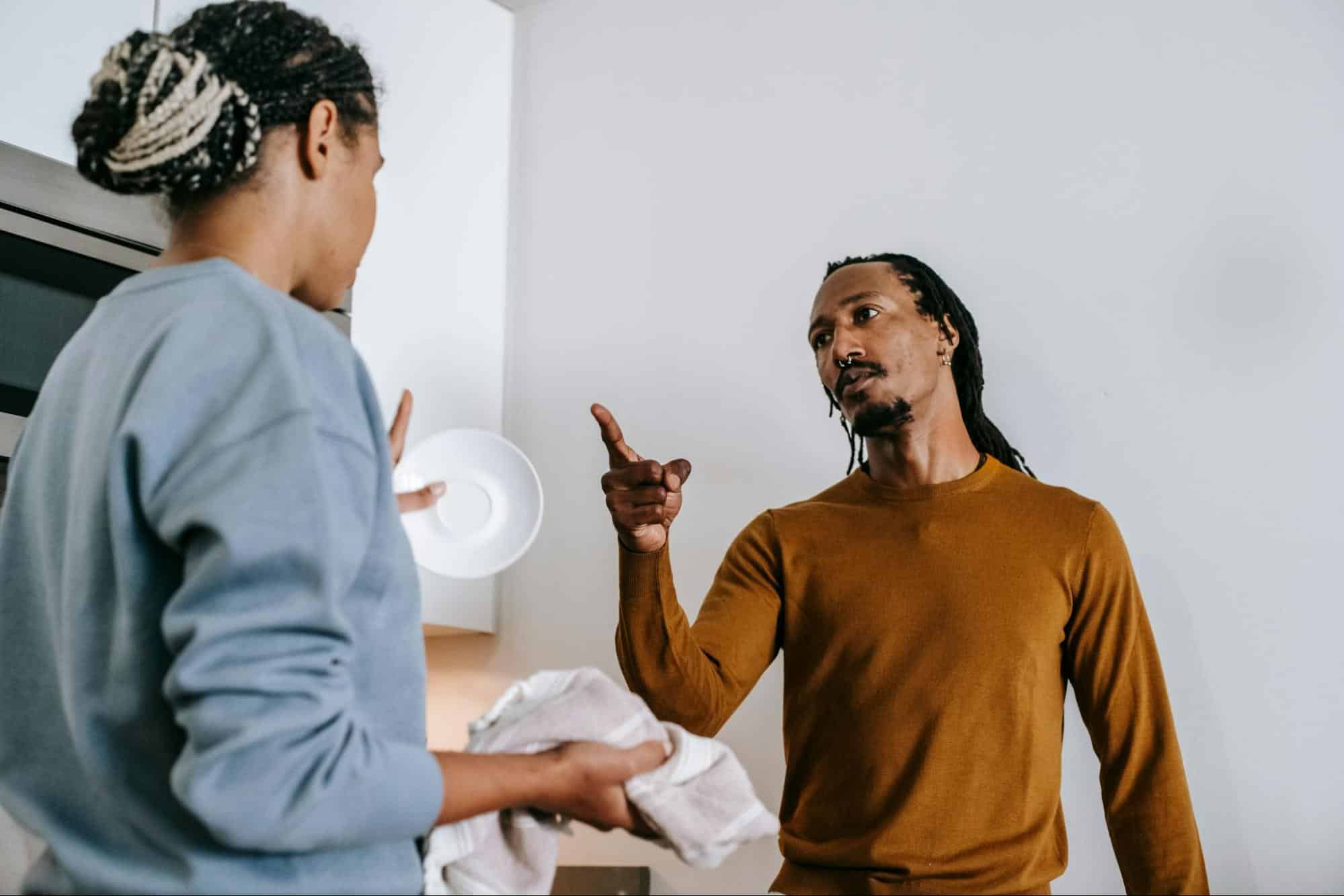 A man and woman having a conflict