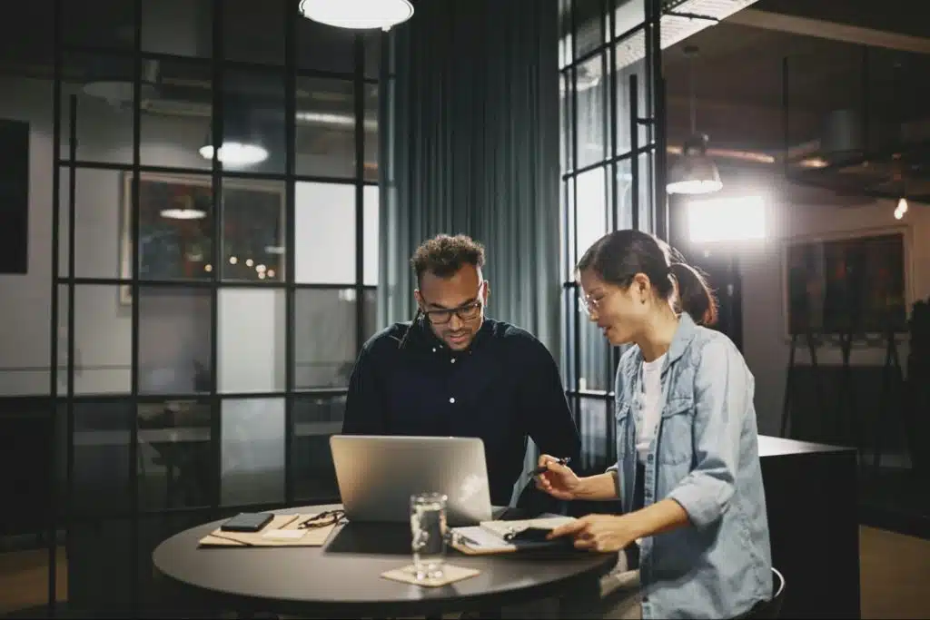A man teaching a woman