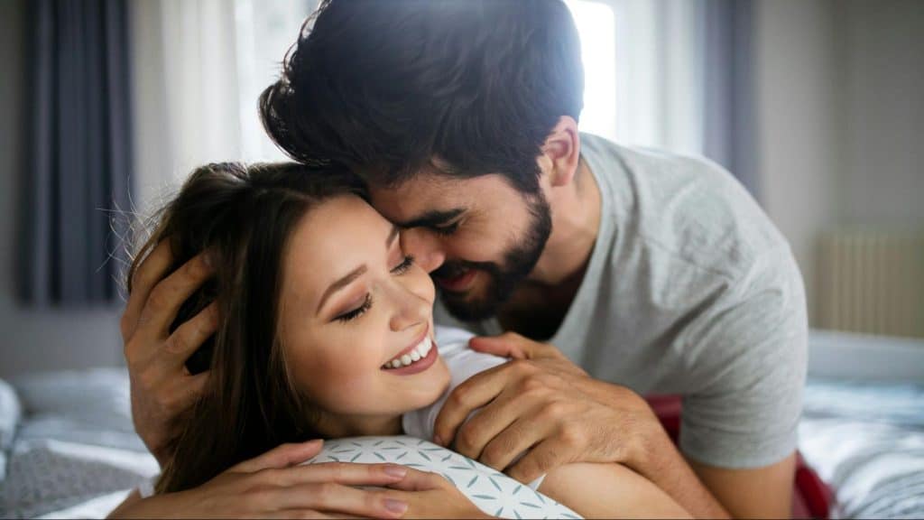 A man and woman close to each other