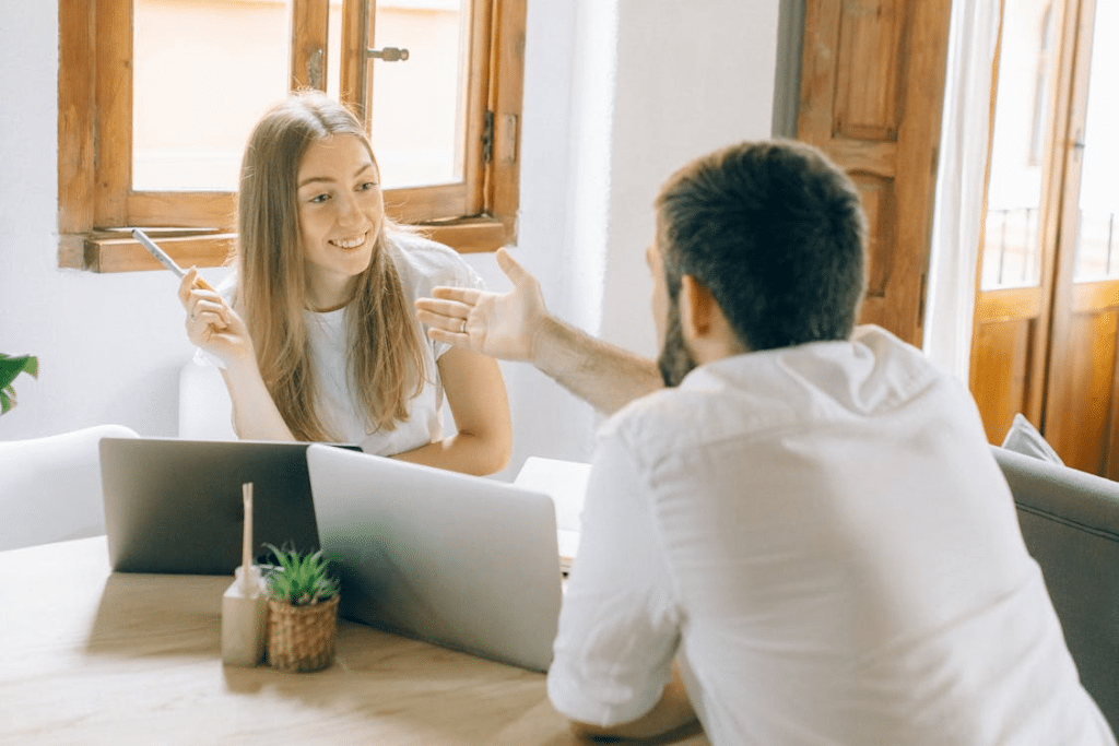 A man and a woman talking