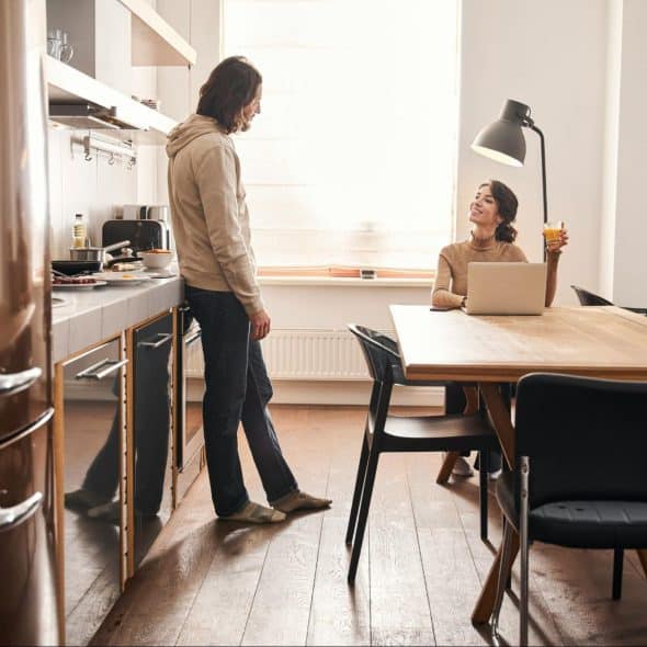 A man and woman having a casual conversation