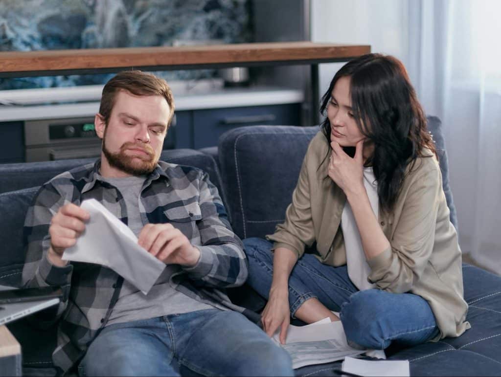 A woman trying to ask a man