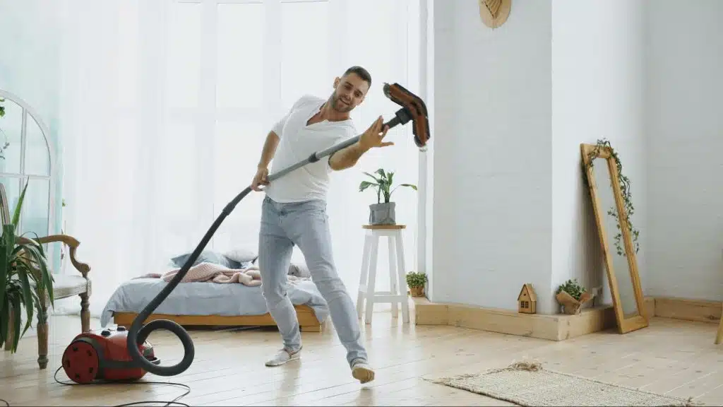 A man using a vacuum
