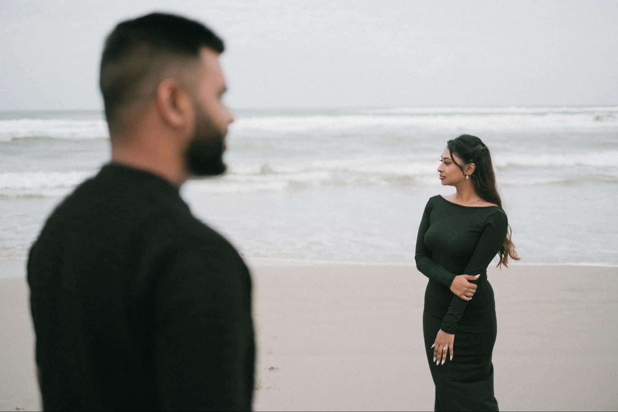 A man and woman standing