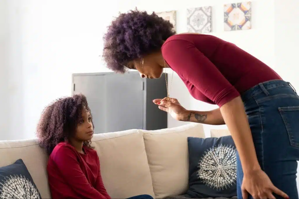 A woman talking to her daughter 