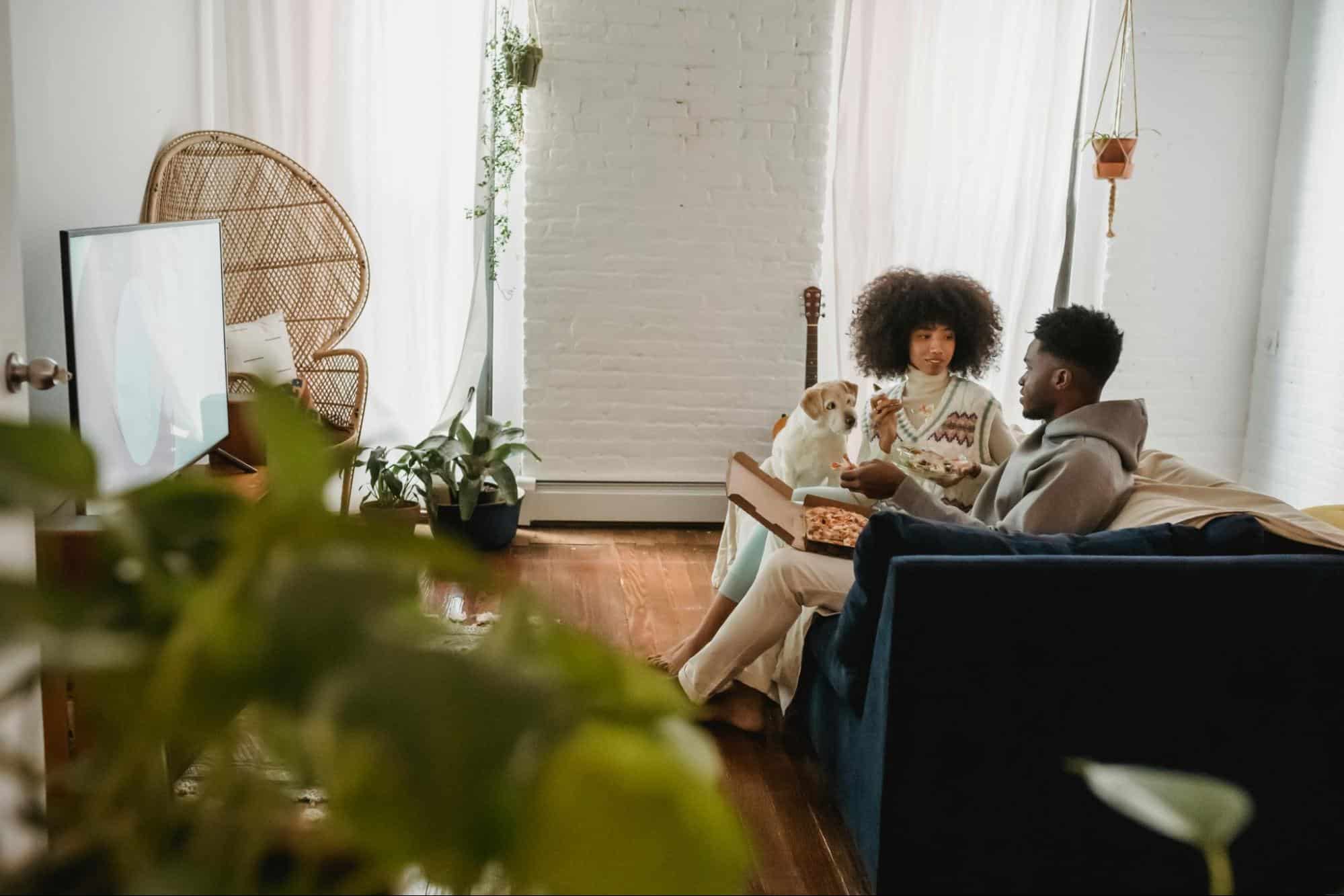 A man and woman on the couch