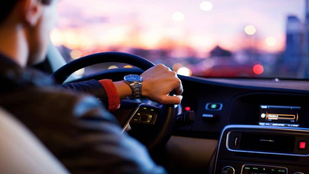 A man driving by himself