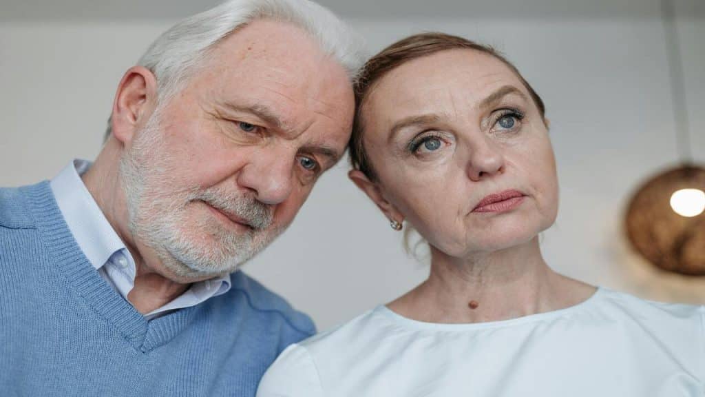 A couple with their heads together