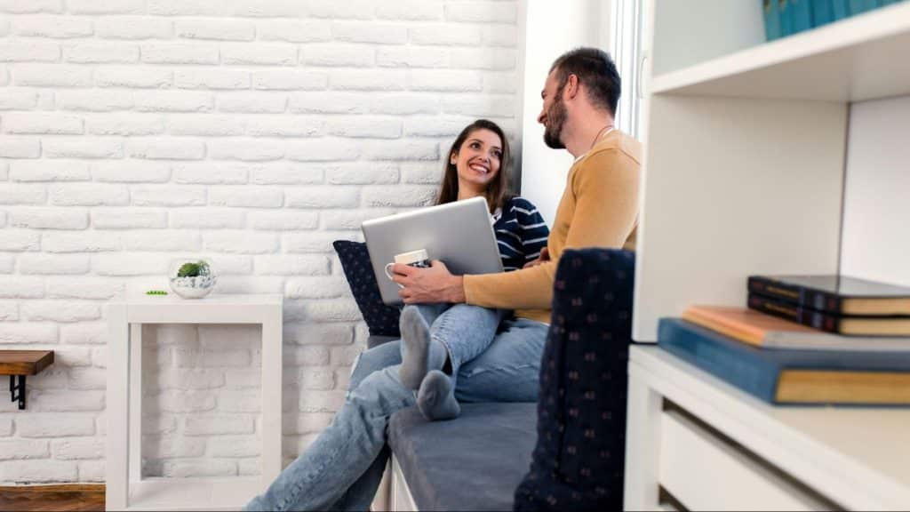 A man and woman talking to each other 