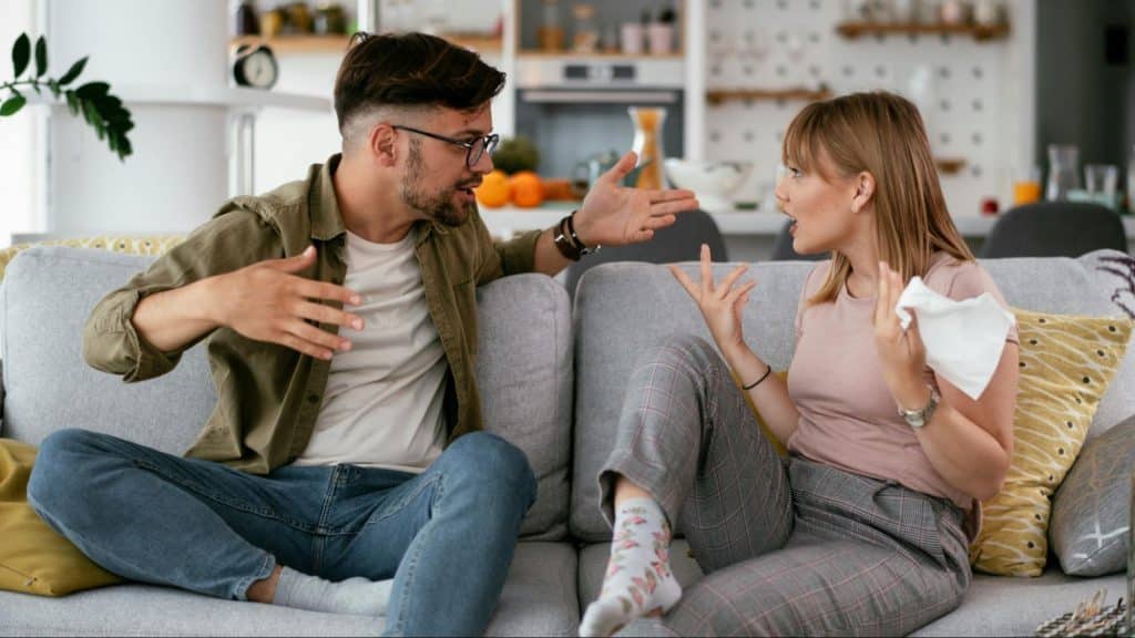 A man and woman having a complaint with each other