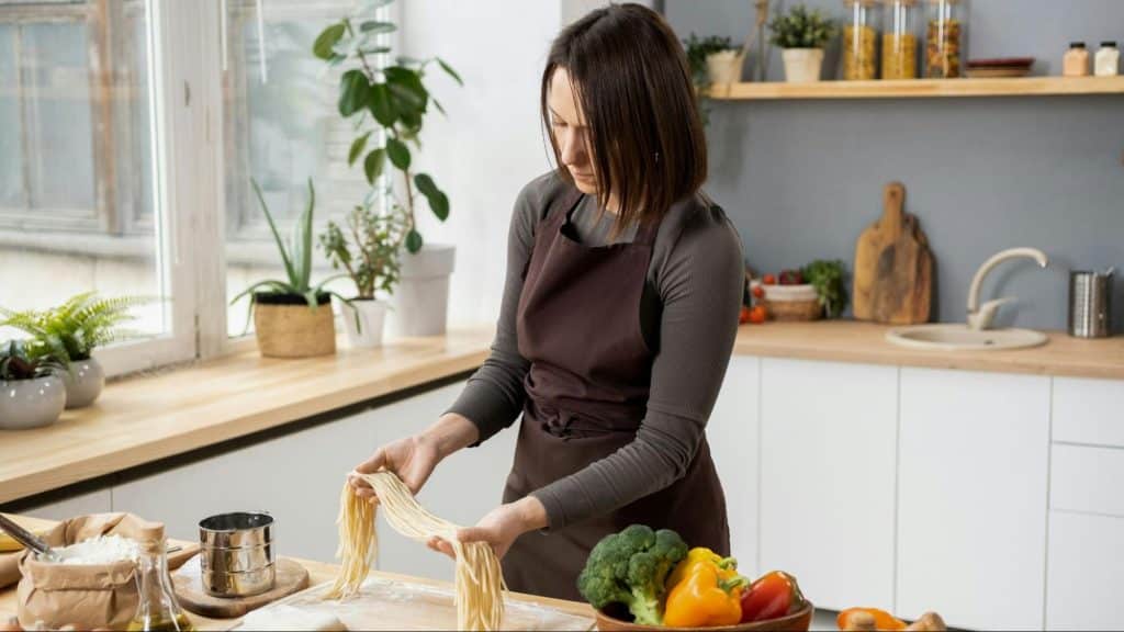 A woman cooking alone