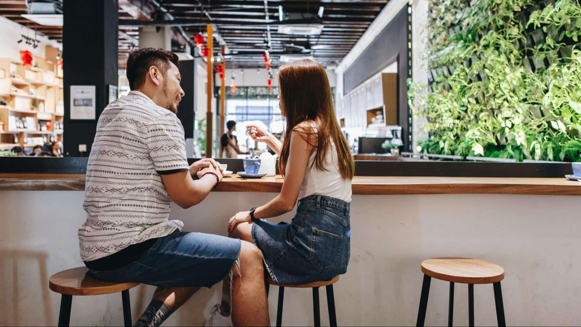 A man and woman talking