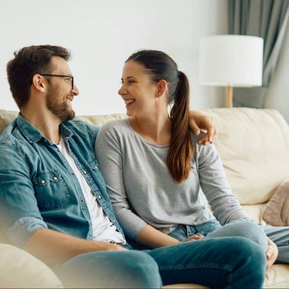 A man and woman talking