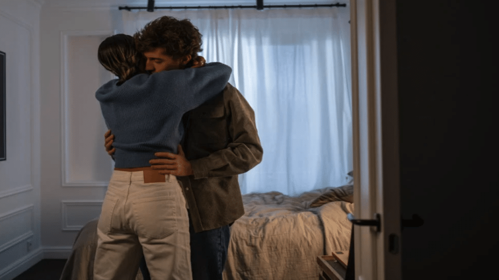 A couple hugging in the bedroom