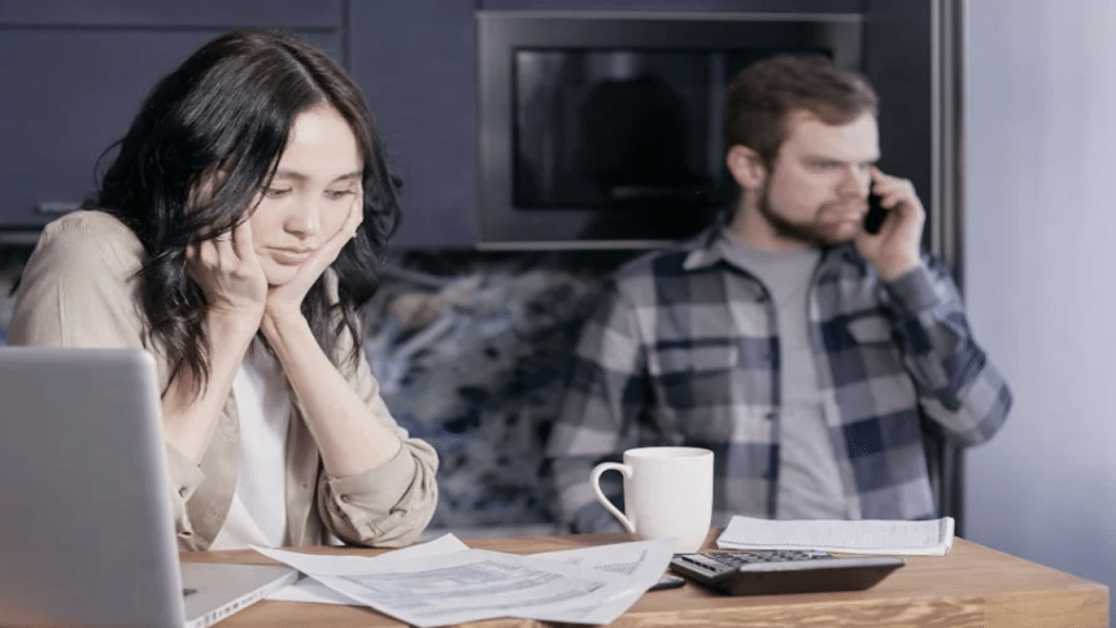 A couple stressed over the bills