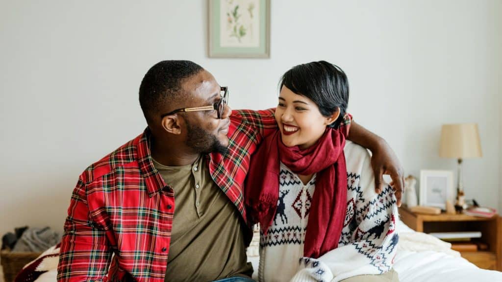 A couple having a conversation during the holidays.