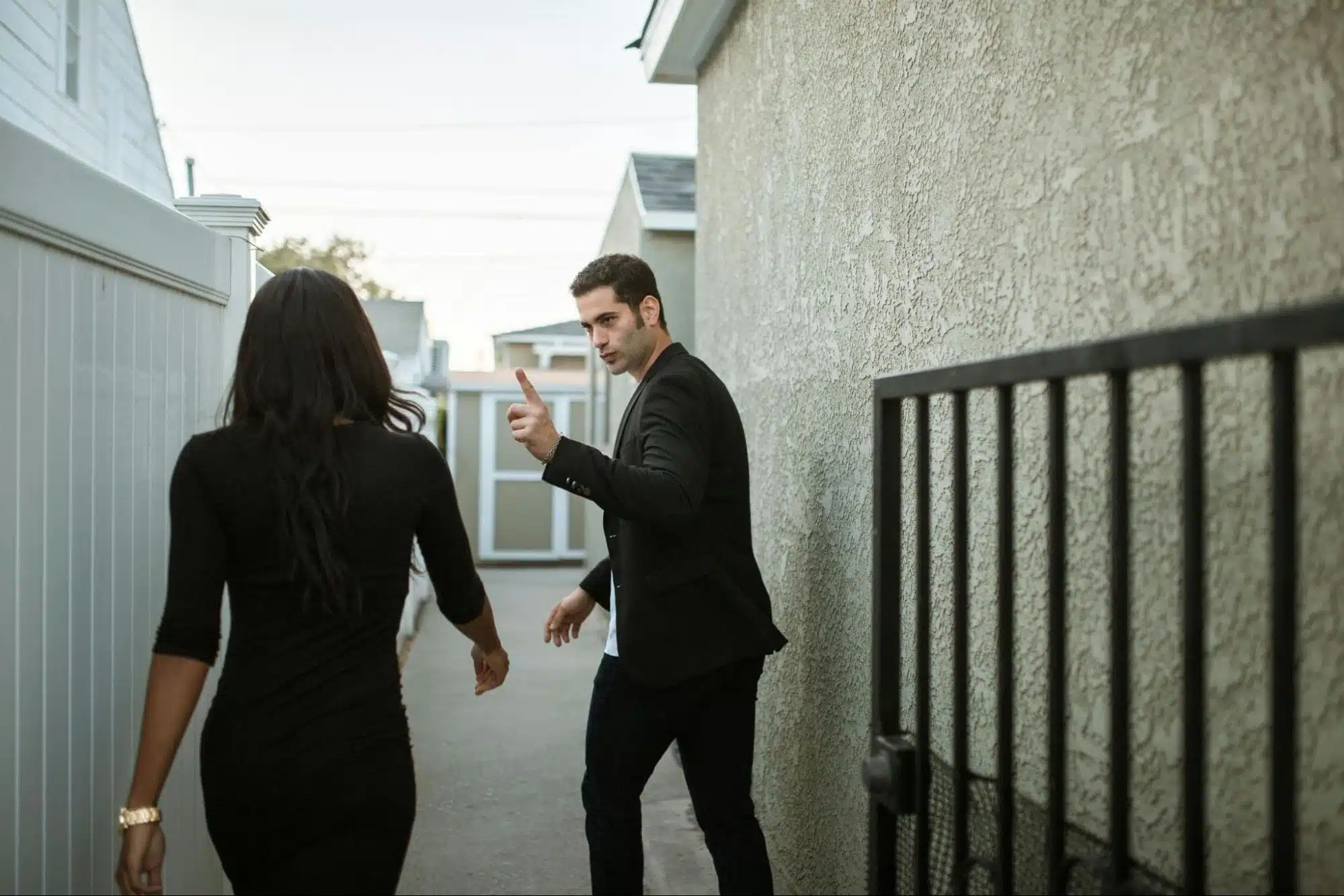 A man demanding something to woman