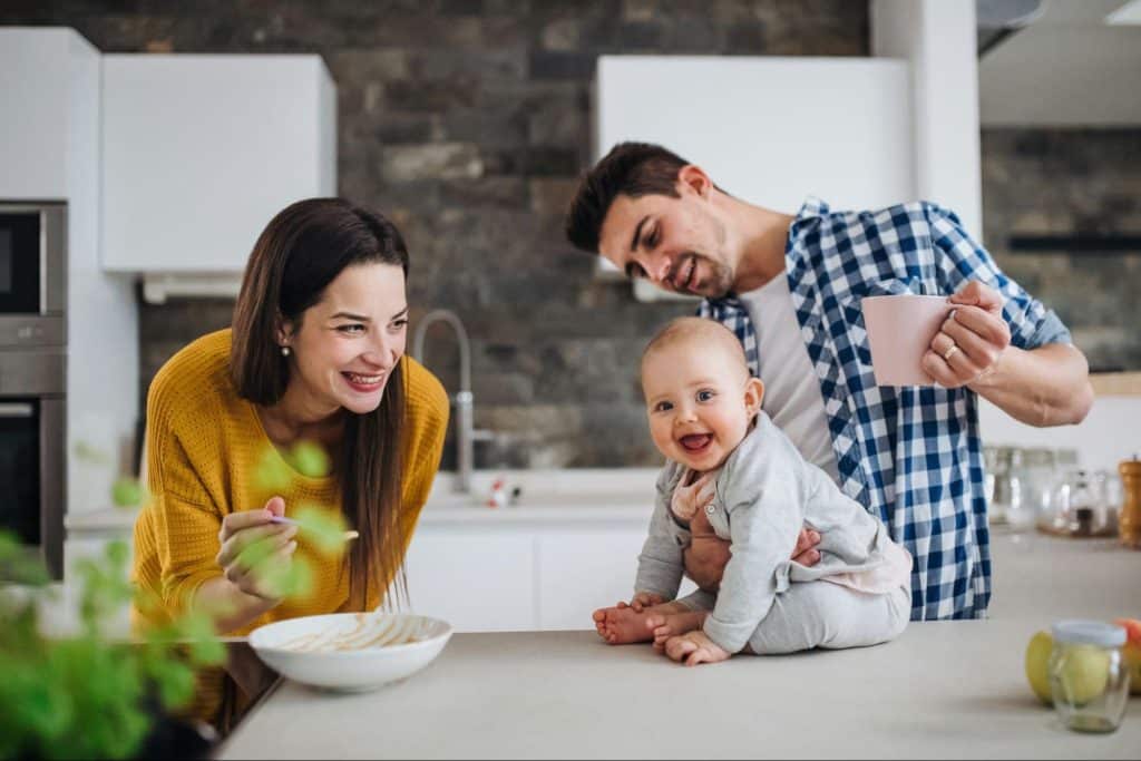 A man and woman with their child