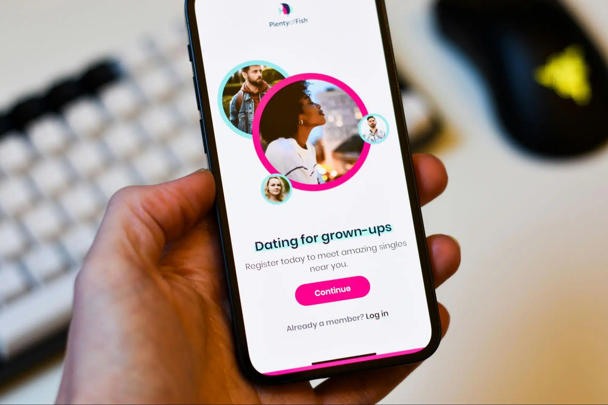 A picture of a person holding a phone with dating-apps on it