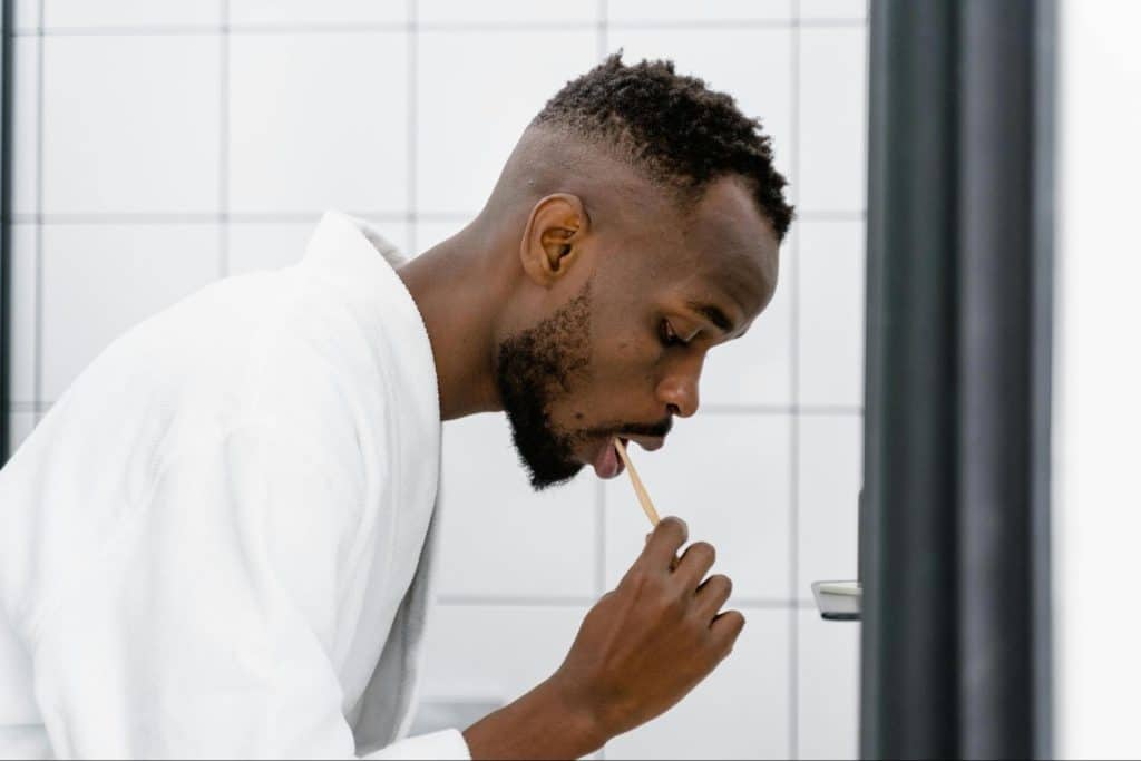 A man brushing teeth