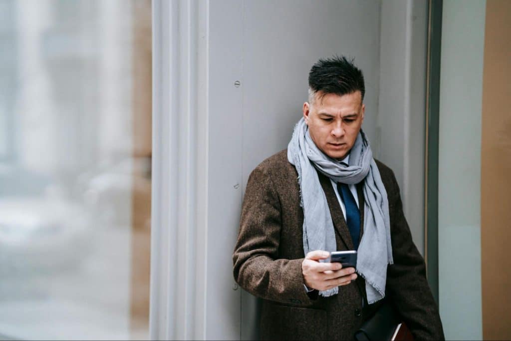 A man waiting patiently for client’s call