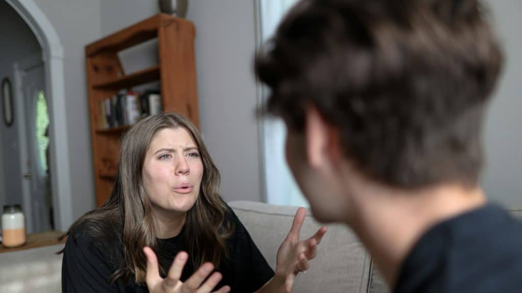 A woman complaining to her husband about his behavior.