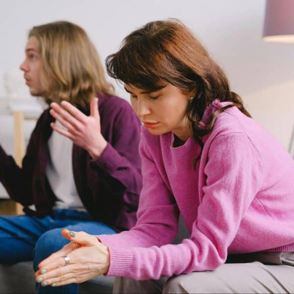 A man talking while a woman stay silent