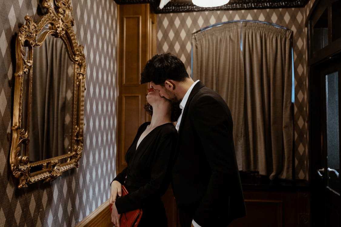 A man kissing a woman