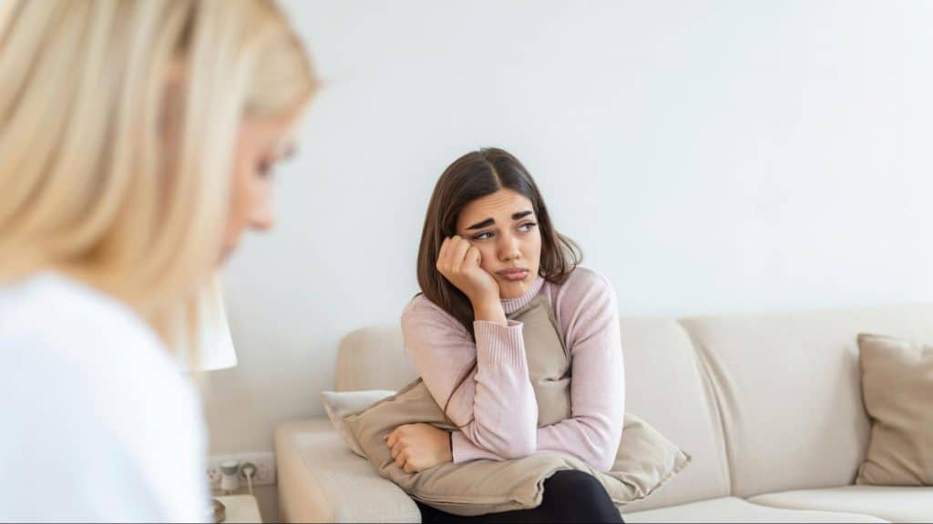 A woman talking to her friend for validation