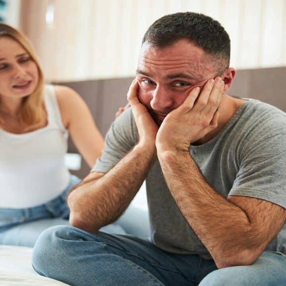 A man trying to ignore his wife