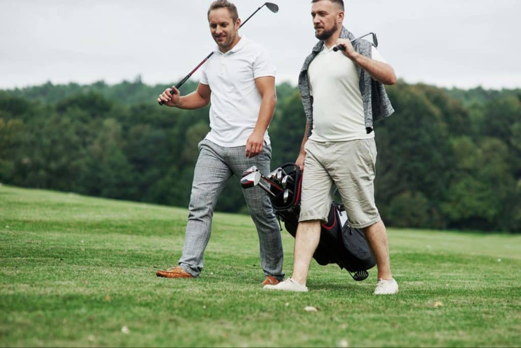 Two men golfing