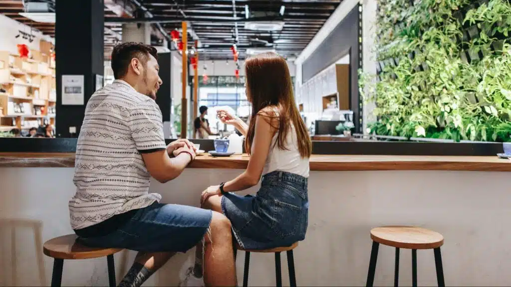 A man and woman talking